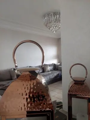 a living room with a couch and a table at Appartement Familial Casablanca in Casablanca
