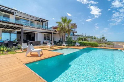 an image of a swimming pool in a house at Skhirat Oceanfront Villa 5 Bedrooms Direct Beach Access in Skhirat