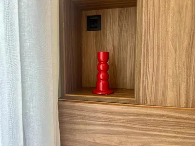 a red vase sitting on a shelf in a room at Luxurious & Central Princesses in Casablanca