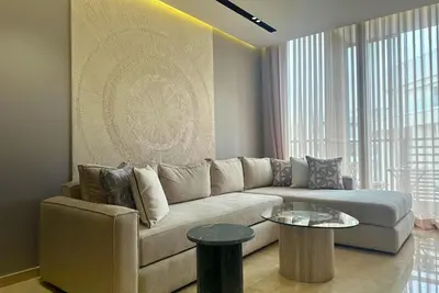 a living room with a couch and a table at Elegant apartment - Princesses in Casablanca