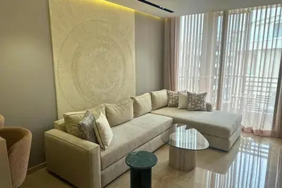a living room with a couch and a table at Elegant apartment - Princesses in Casablanca