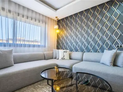 a living room with a couch and a table at Casa Contemporary 3 Beds - By AppartAli in Casablanca