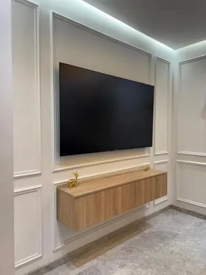 a large flat screen tv on a wall at Luxe studio plein centre ville in Casablanca