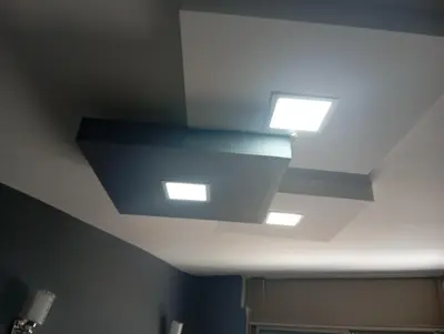 a ceiling with three lights in a bathroom at Loge studio agdal in Rabat