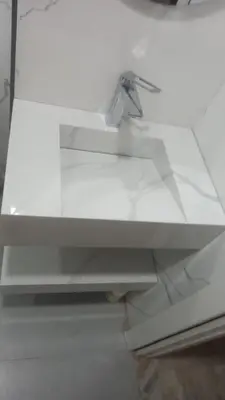 a glass table with a scissors on top of it at Appt Mansbay beach in Mansouria