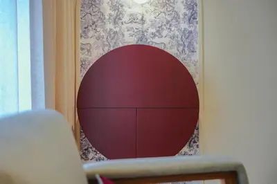 a mirror in the corner of a room at Marhaba Experience Appartement Luxe Belvedere in Casablanca
