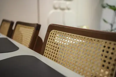 a close up of a table with two chairs at Marhaba Experience Appartement Luxe Belvedere in Casablanca