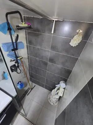 a bathroom with a shower with a toilet in it at Appartement meublée à RABAT for CAN 2025 in Temara