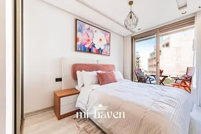 a bedroom with a bed and a window at Sakura - 100 Mbps Wi-Fi - Downtown Casablanca in Casablanca