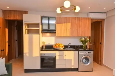 a kitchen with a bowl of fruit on the counter at Studio 01 Maarif - High Speed Wi-Fi in Casablanca