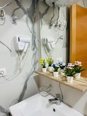 a bathroom with a sink and a mirror at Studio lumineux pour un séjour agréable 28 in Casablanca