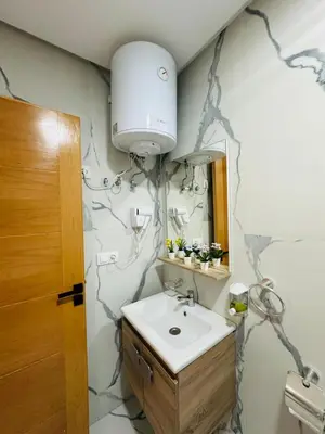 a bathroom with a sink and a mirror at Studio lumineux pour un séjour agréable 28 in Casablanca