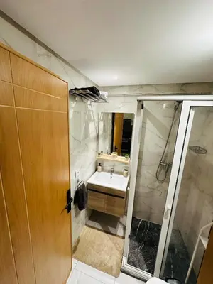 a bathroom with a sink and a shower at Studio moderne et accueillant, pour se reposer 14 in Casablanca