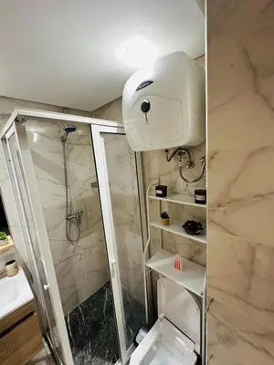 a bathroom with a shower and a sink and a toilet at Studio moderne et accueillant, pour se reposer 14 in Casablanca