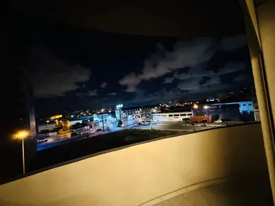 a view from a window of a parking lot at night at Studio tout équipé pour un séjour confortable 22 in Casablanca