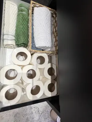 a drawer filled with toilet paper and towels at Business Executive Apartment Central Casablanca in Casablanca