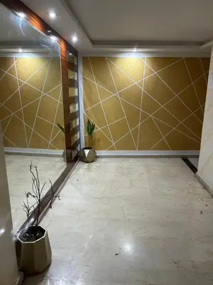 an empty room with a staircase in a room at Rihab's House in Casablanca