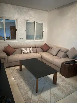 a living room with a couch and a coffee table at Rihab's House in Casablanca