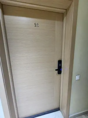a close up of a door with the number twenty eight at Modern Studio Panoramic View with Wi-Fi et Parking in LʼOasis