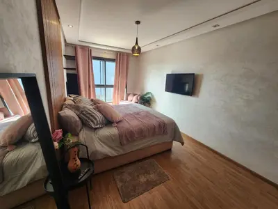 a bedroom with a bed and a window at Modern Studio Panoramic View with Wi-Fi et Parking in LʼOasis