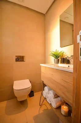 a bathroom with a toilet and a sink at Studio 09 Maarif - High Speed Wi-Fi in Casablanca