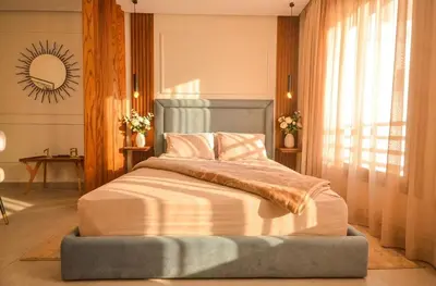 a bedroom with a large bed with a large window at Studio 09 Maarif - High Speed Wi-Fi in Casablanca