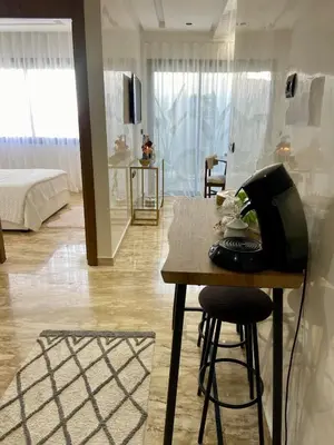 a room with a desk with a telephone on it at Le Miroir in Casablanca