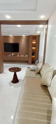 a living room with a couch and a table at Samir in Temara