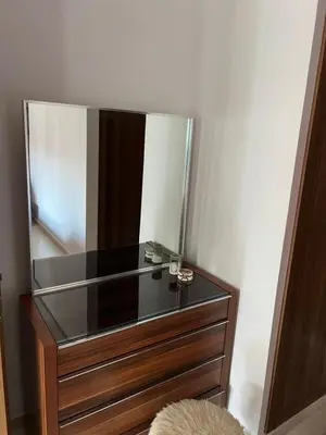 a mirror on top of a dresser in a room at Costa in Bouznika