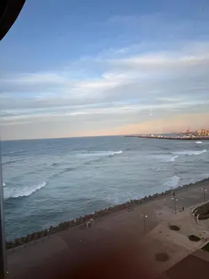 a view of the ocean from a balcony of a beach at Marina de Casablanca in Casablanca