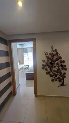 a room with a decoration on the wall at Blue Haven Pool Suites in Pont Blondin