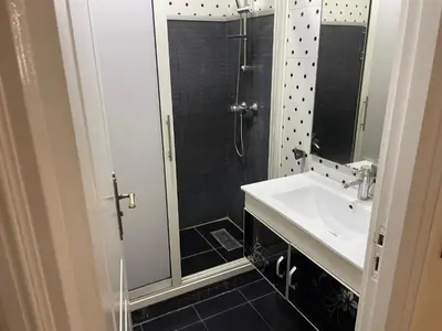 a bathroom with a sink and a shower at Casablanca Apartments & B&Bs in Casablanca