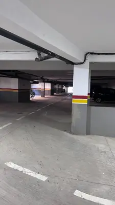 a parking garage with a car parked in it at Magic house in Mansouria