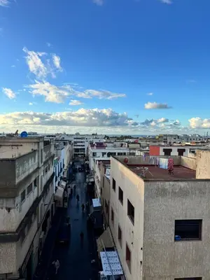 an overhead view of a city street with buildings at Petit Apparemment pas chère à 3km du grand stade de rabat in Temara