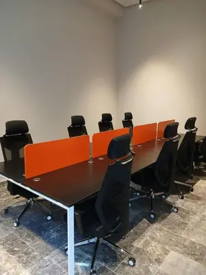 a conference room with a table and chairs at BeauLiving Park in Casablanca