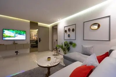 a living room with a couch and a tv at Luxury Studio near to hassan 2 in Casablanca