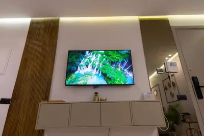 a flat screen tv on a wall in a room at Luxury Studio near to hassan 2 in Casablanca