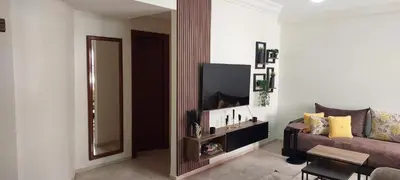 a living room with a couch and a mirror at Lina Cozy City Apartment in Casablanca