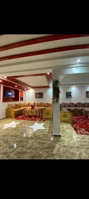 an empty lobby with an american flag painted on the floor at Appartement meublé à louer in Rabat