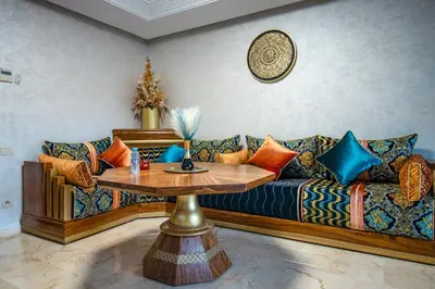 a living room with a couch and a table at Forest View -3 Bedroom Apartment - Near Airport in Nouaseur