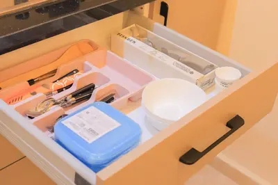 a drawer filled with items in a cabinet at New and bright stylish studio in Casablanca