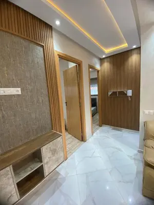 a hallway of a house with a living room at Sunny Cozy House Close to the Beach in Bouznika