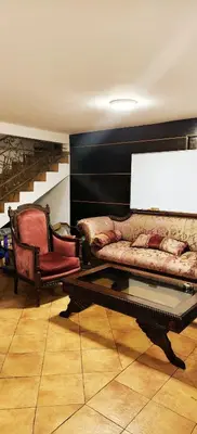 a living room with a couch and two chairs at \u9526\u9ca4JinLi 28villa in Casablanca