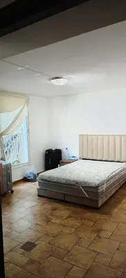a bedroom with a bed and a large window at \u9526\u9ca4JinLi 28villa in Casablanca