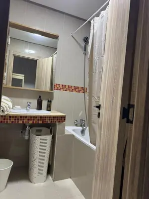 a bathroom with a sink and a shower and a toilet at Opposite Train Station & Tram Modern Quiet & Meals Available in Casablanca