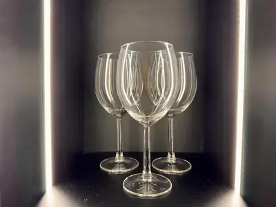 three wine glasses sitting on top of a table at Cozy & Central with Terrace, Parking and Fiber Wifi in Casablanca