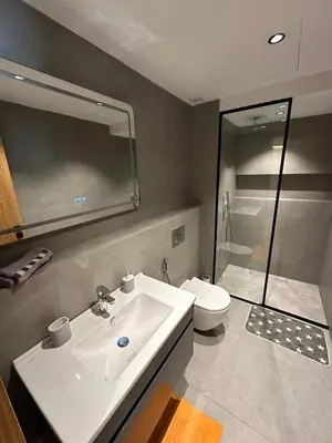 a bathroom with a sink and a toilet and a shower at Apartment in Maarif in Maarif