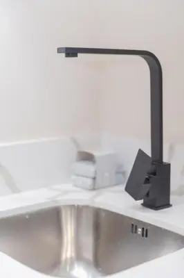 a bathroom counter with a sink and a mirror at Premium Studio H&M - Near CFC and Anfa Park in Casablanca