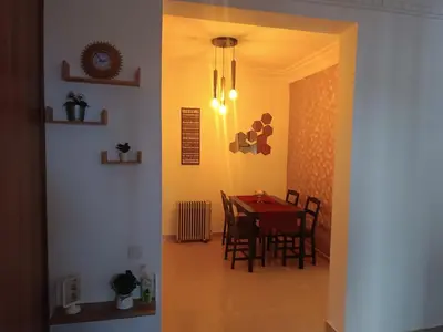 a dining room with a table and chairs in a room at Opposite Train Station & Tram Modern, Quiet & Meals Available in Casablanca