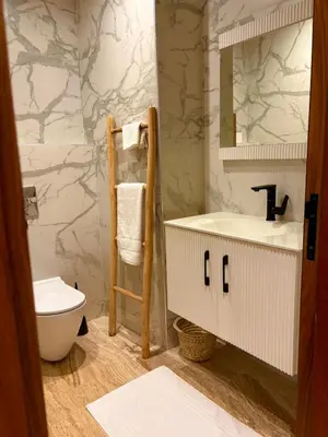 a bathroom with a sink and a toilet at Quiet, Sunny Studio 3 min CFC - Self-Check-In in Casablanca